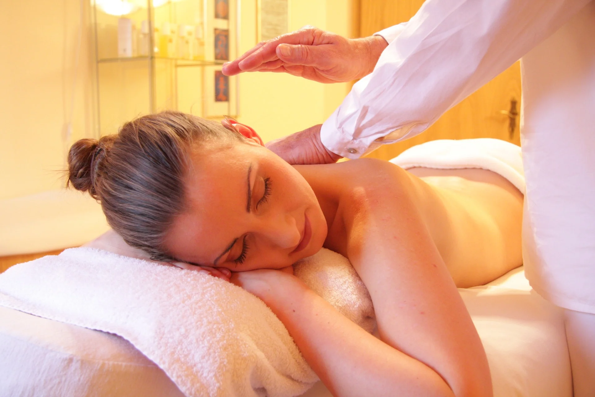 A guest relaxing during a massage